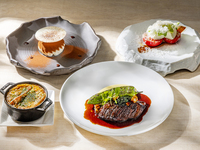 Full course lunch consisting of appetizer, soup, main course and dessert