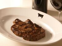 21-day aged Black Angus beef rib steak course