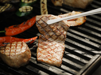 Enjoy a garden terrace barbecue surrounded by a forest of green maple leaves.