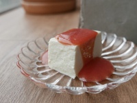 Lemon verbena panna cotta with plum sauce