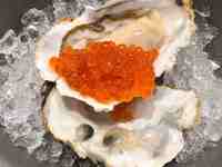 The bounty of the sea, in one bite – How many raw oysters can you pile on?